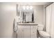 Clean bathroom with granite countertop, white cabinets, and a shower/tub combo at 3135 Seven Pines Ct # 101, Atlanta, GA 30339