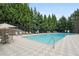 Inviting community pool with plenty of lounge chairs at 3135 Seven Pines Ct # 101, Atlanta, GA 30339