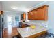 Modern kitchen with granite countertops and wood cabinets at 4083 Brookside Manor Dr, Tucker, GA 30084