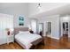 Main bedroom with hardwood floors and an ensuite bathroom at 4083 Brookside Manor Dr, Tucker, GA 30084