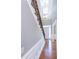 Bright, open staircase with wrought iron railing at 4083 Brookside Manor Dr, Tucker, GA 30084