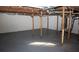 Unfinished basement with high ceilings and ample storage space at 3685 Emily Way, Atlanta, GA 30349