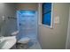 Clean bathroom with white vanity, toilet and shower at 3685 Emily Way, Atlanta, GA 30349