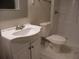 Bathroom with white vanity and toilet at 3685 Emily Way, Atlanta, GA 30349