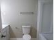 Bathroom with white toilet and bathtub at 3685 Emily Way, Atlanta, GA 30349