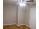 Bedroom with hardwood floors and neutral wall paint at 3685 Emily Way, Atlanta, GA 30349