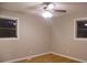 Spacious bedroom with hardwood floors and ceiling fan at 3685 Emily Way, Atlanta, GA 30349