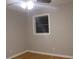 Bedroom with hardwood floors and window at 3685 Emily Way, Atlanta, GA 30349