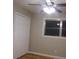 Well-lit bedroom with hardwood floors and double door closet at 3685 Emily Way, Atlanta, GA 30349