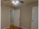 Bright bedroom with hardwood floors and ceiling fan at 3685 Emily Way, Atlanta, GA 30349