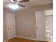 Bedroom with hardwood floor and bathroom access at 3685 Emily Way, Atlanta, GA 30349