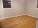 Hardwood floors and neutral walls in bedroom at 3685 Emily Way, Atlanta, GA 30349