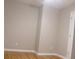 Spacious bedroom with neutral walls and hardwood floors at 3685 Emily Way, Atlanta, GA 30349