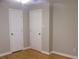 Bedroom with hardwood floors and two closets at 3685 Emily Way, Atlanta, GA 30349