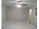 Bright dining room features a ceiling fan and new flooring at 3685 Emily Way, Atlanta, GA 30349