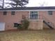 Brick house with attached garage and a balcony at 3685 Emily Way, Atlanta, GA 30349