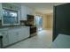 Modern kitchen with stainless steel appliances and white cabinets at 3685 Emily Way, Atlanta, GA 30349