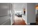 Inviting condo entrance to living area featuring hardwood floors, modern lighting, and expansive city views at 3338 Peachtree Ne Rd # 3406, Atlanta, GA 30326