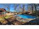 Relaxing backyard oasis featuring a sparkling pool and spacious deck at 557 Mccullough Rd, Stockbridge, GA 30281