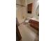 Clean bathroom with a tub, toilet, and vanity at 557 Mccullough Rd, Stockbridge, GA 30281