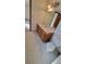 Clean bathroom with wood vanity and tile floor at 557 Mccullough Rd, Stockbridge, GA 30281