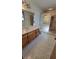 Bathroom with shower and double vanity at 557 Mccullough Rd, Stockbridge, GA 30281