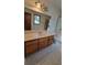 Bright bathroom features a large vanity and tile floor at 557 Mccullough Rd, Stockbridge, GA 30281