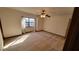 Bright bedroom with a large window and ceiling fan at 557 Mccullough Rd, Stockbridge, GA 30281