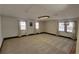 Spacious bonus room with neutral carpeting and multiple windows at 557 Mccullough Rd, Stockbridge, GA 30281