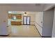 Bright dining area with wood cabinets and patio doors at 557 Mccullough Rd, Stockbridge, GA 30281