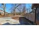 Curved driveway with ample parking and wooded backdrop at 557 Mccullough Rd, Stockbridge, GA 30281