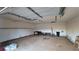 Spacious garage with workbench and storage shelving at 557 Mccullough Rd, Stockbridge, GA 30281