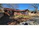 Back of house with screened porch and large backyard at 557 Mccullough Rd, Stockbridge, GA 30281