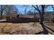 Front yard view of charming one-story home at 557 Mccullough Rd, Stockbridge, GA 30281