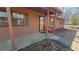 Front view of a ranch house with covered porch and brown siding at 557 Mccullough Rd, Stockbridge, GA 30281