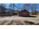 Side view of house showcasing a ranch-style home at 557 Mccullough Rd, Stockbridge, GA 30281