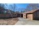 Rear view of house showing patio and backyard at 557 Mccullough Rd, Stockbridge, GA 30281