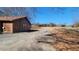 Side view of house with driveway and yard at 557 Mccullough Rd, Stockbridge, GA 30281