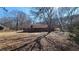 Front yard view of charming one-story home at 557 Mccullough Rd, Stockbridge, GA 30281