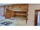 Image shows kitchen cabinets and a double sink at 557 Mccullough Rd, Stockbridge, GA 30281