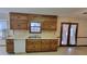 Kitchen features a double sink, dishwasher, and patio access at 557 Mccullough Rd, Stockbridge, GA 30281