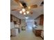 Bright kitchen with ample cabinetry and a ceiling fan at 557 Mccullough Rd, Stockbridge, GA 30281