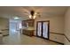 Kitchen with ceiling fan, ample cabinets and patio doors at 557 Mccullough Rd, Stockbridge, GA 30281