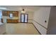 Kitchen with wood cabinets and access to dining area at 557 Mccullough Rd, Stockbridge, GA 30281