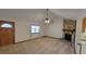 Living room with stone fireplace and high ceiling at 557 Mccullough Rd, Stockbridge, GA 30281