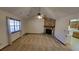 Spacious living room featuring a stone fireplace and vaulted ceiling at 557 Mccullough Rd, Stockbridge, GA 30281