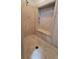 Walk-in shower with built-in seat and shelving at 557 Mccullough Rd, Stockbridge, GA 30281