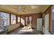Bright sunroom features ample windows and access to the backyard at 557 Mccullough Rd, Stockbridge, GA 30281