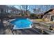 Relaxing above ground pool in sunny backyard setting at 557 Mccullough Rd, Stockbridge, GA 30281