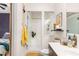 Well-lit bathroom featuring a glass-enclosed shower, subway tiles, and modern fixtures at 978 North Ne Ave # 107, Atlanta, GA 30306